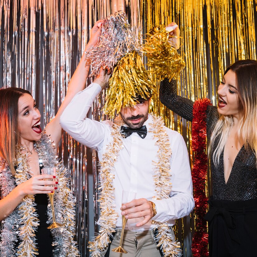friends-2018-party_23-2147717220 Friends celebrating at an Ottawa event with Luxe Photobooth using festive tinsel and props