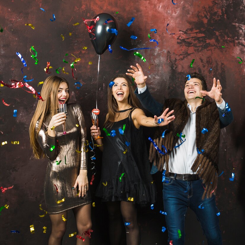 three-friends-having-2018-party_23-2147720448 Friends throwing confetti and celebrating with Luxe Photobooth’s premium setup in Gatineau.